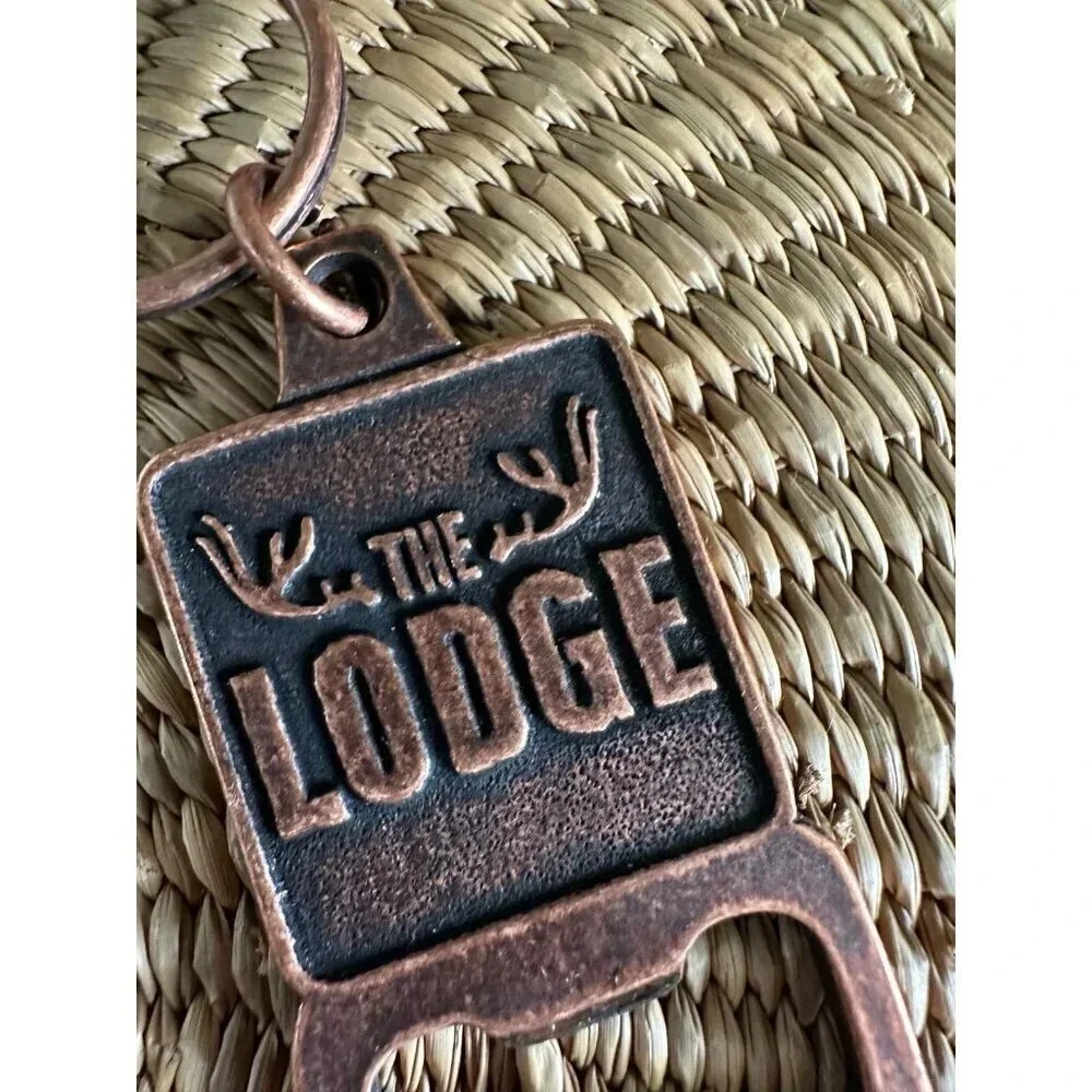 The Lodge metal bottle opener